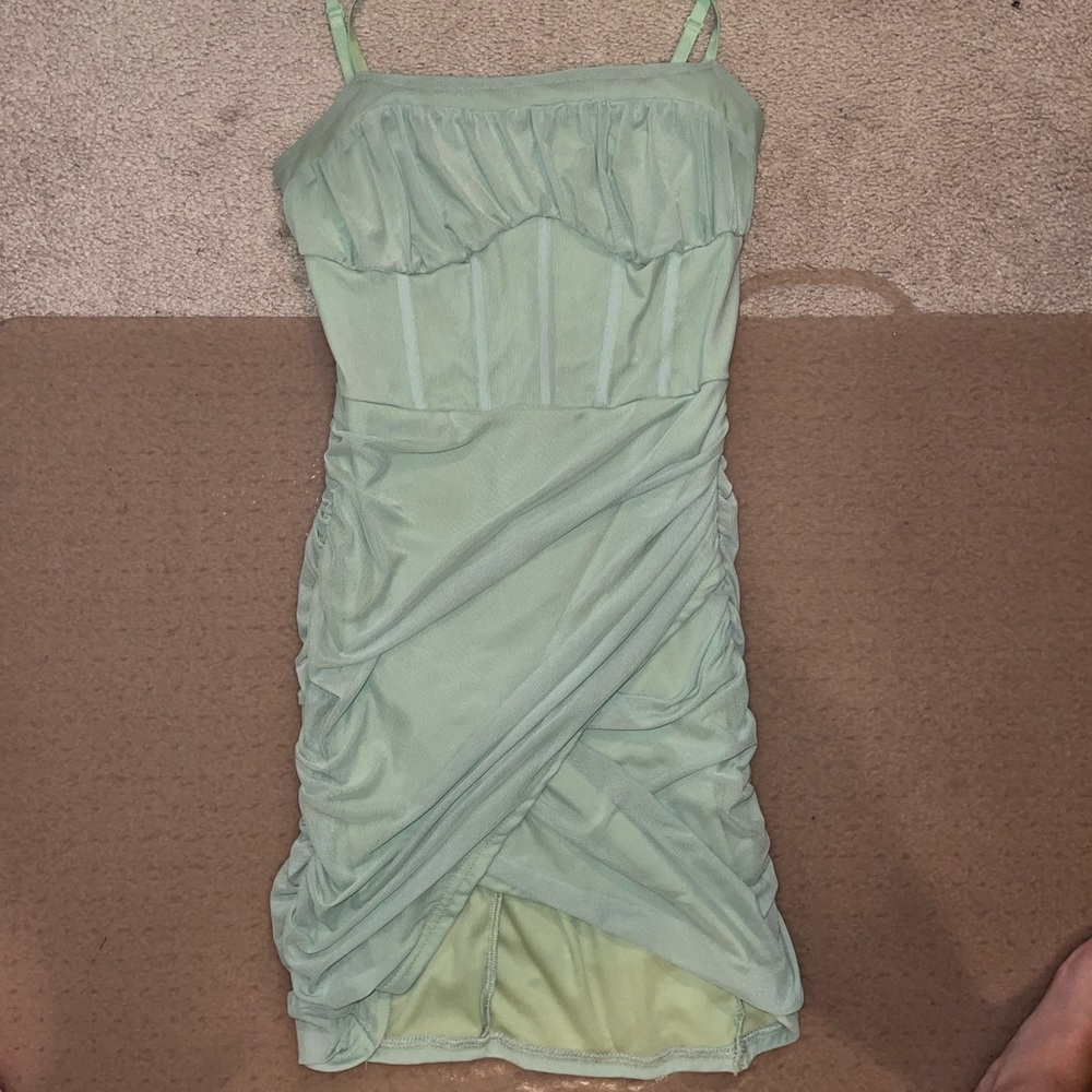 Fitted and ruched dress very flattering